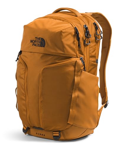 THE NORTH FACE Surge Commuter Laptop Backpack | Daypack With Water Repellent Finish, 16" Laptop Sleeve, Reflective Details - color: Timber Tan, size: One Size