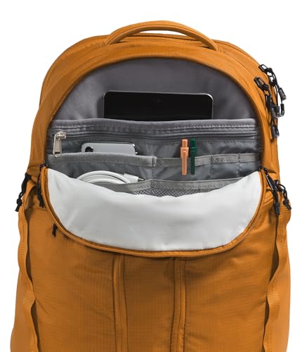 THE NORTH FACE Surge Commuter Laptop Backpack | Daypack With Water Repellent Finish, 16" Laptop Sleeve, Reflective Details - color: Timber Tan, size: One Size
