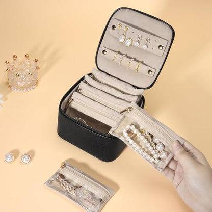 DesignSter Small Jewelry Box, Travel Small Jewelry Organizer with Earring Tray and Ring Holder, Square Travel Jewelry Storage Case with 6 Velvet Jewelry Pouches, Black - color: Black
