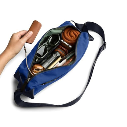 Bellroy Classic Sling (everyday 7 liter minimalist crossbody bag with internal organization, adjustable strap, and auto-compression system) - Indigo - color: Indigo