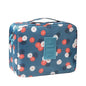 Large Capacity Travel Toiletry Bag, 9x5x4 Inch Makeup and Bathroom Organizer with Water-Resistant Fabric, Blue Floral Design
