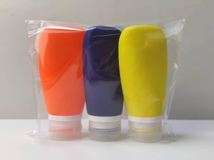 Travel Bottles for Toiletries, TSA Approved 3oz Leak Proof Silicone Refillable Squeeze Travel Size Containers BPA Free for Cleansers, Lotions, Shampoo 3pk (Orange-Blue-Yellow). - color: Yellow-Navy Blue-Orange