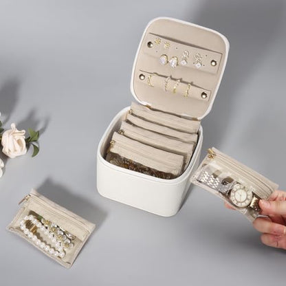 DesignSter Small Jewelry Box, Travel Small Jewelry Organizer with Earring Tray and Ring Holder, Square Travel Jewelry Storage Case with 6 Velvet Jewelry Pouches, Beige - color: Beige