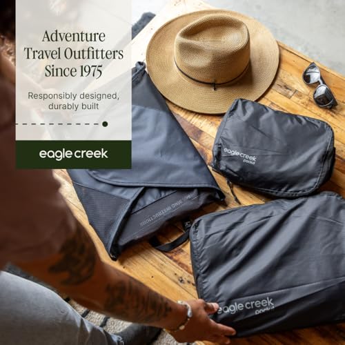 Eagle Creek Pack-It Reveal Garment Folder - Travel Garment Bag with Compression Wings to Maximize Luggage Space - Convenient Top Handle - Quick Drying Material - Black - Medium - color: Black
